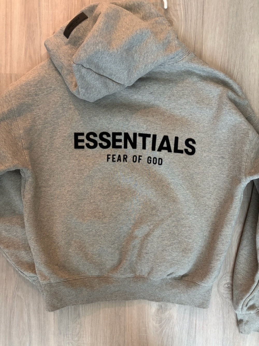 Fear of God ESSENTIALS Heather Grey Hoodie with Black Logo